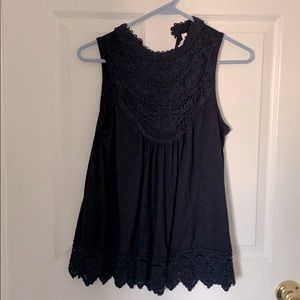 High neck blue sleeveless shirt